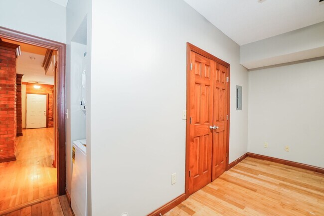 Building Photo - Charming 1-Bedroom Apartment with Exposed Brick, Hardwood Floors & Updated Kitchen