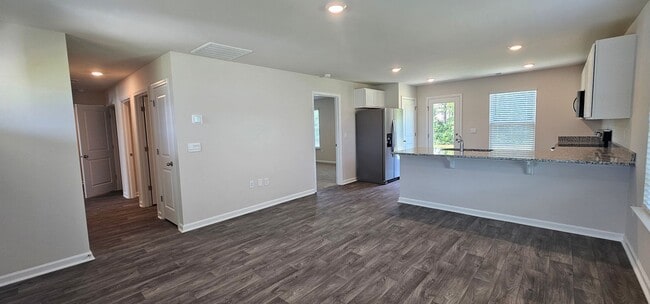 Building Photo - Brand-New Smart Home in the Gated Sandpipe...