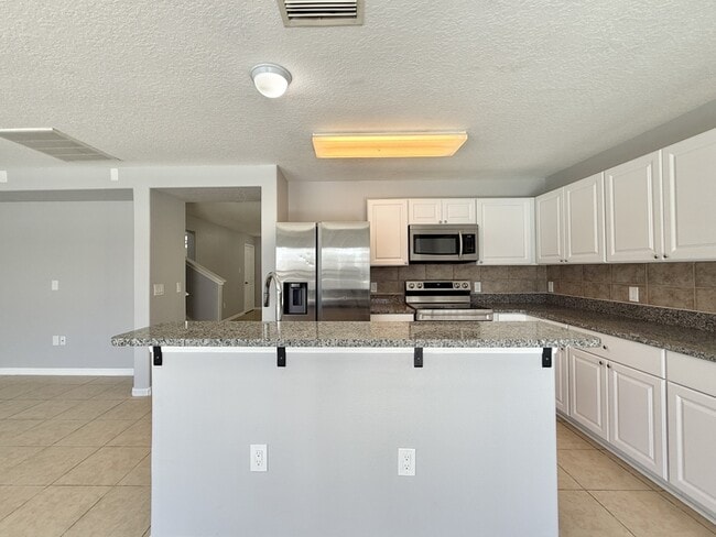 Building Photo - 10325 Boyette Creek Blvd