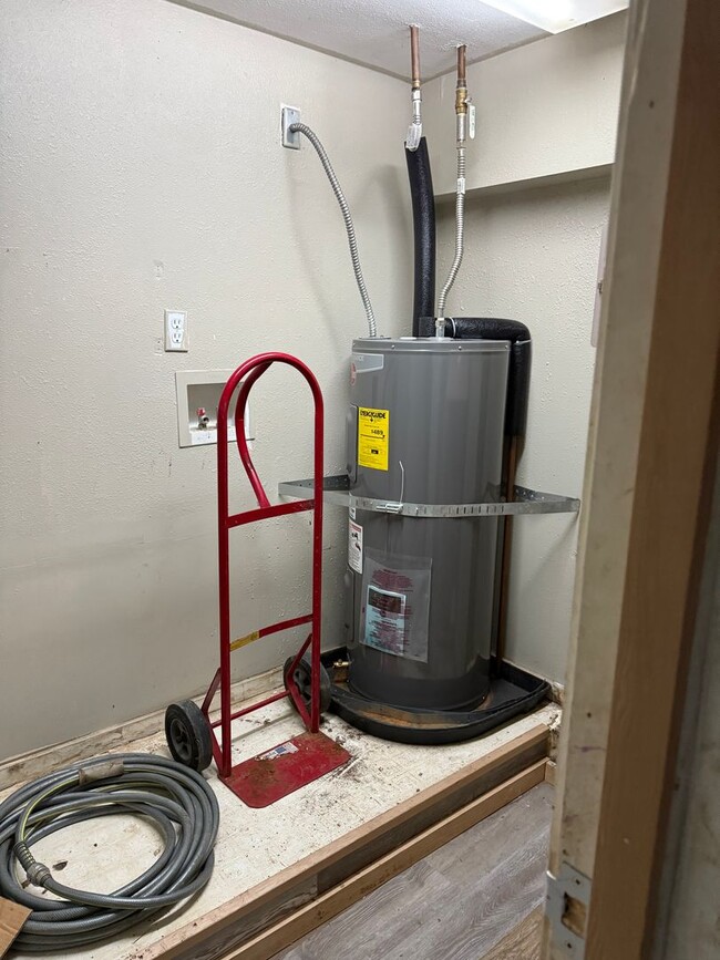 Building Photo - Spacious Two-Story with Country Kitchen and Low-Maintenance Yard