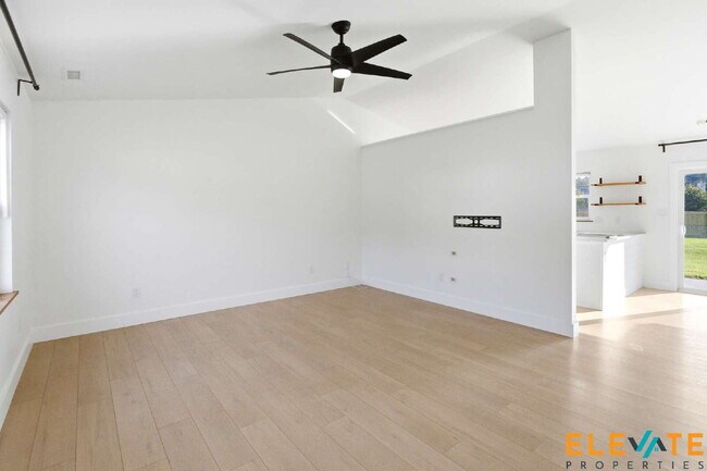 Building Photo - Beautiful Like-New 3 Bedroom Home with Huge Fenced Yard, Greenhouse & Storage