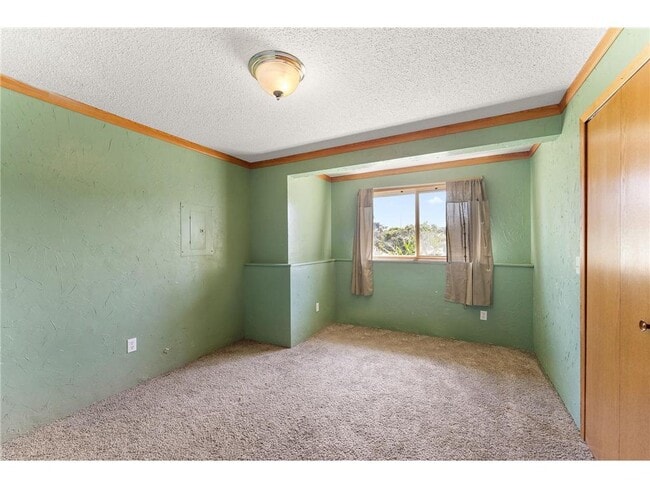 Building Photo - 5785 Yucca Ln N
