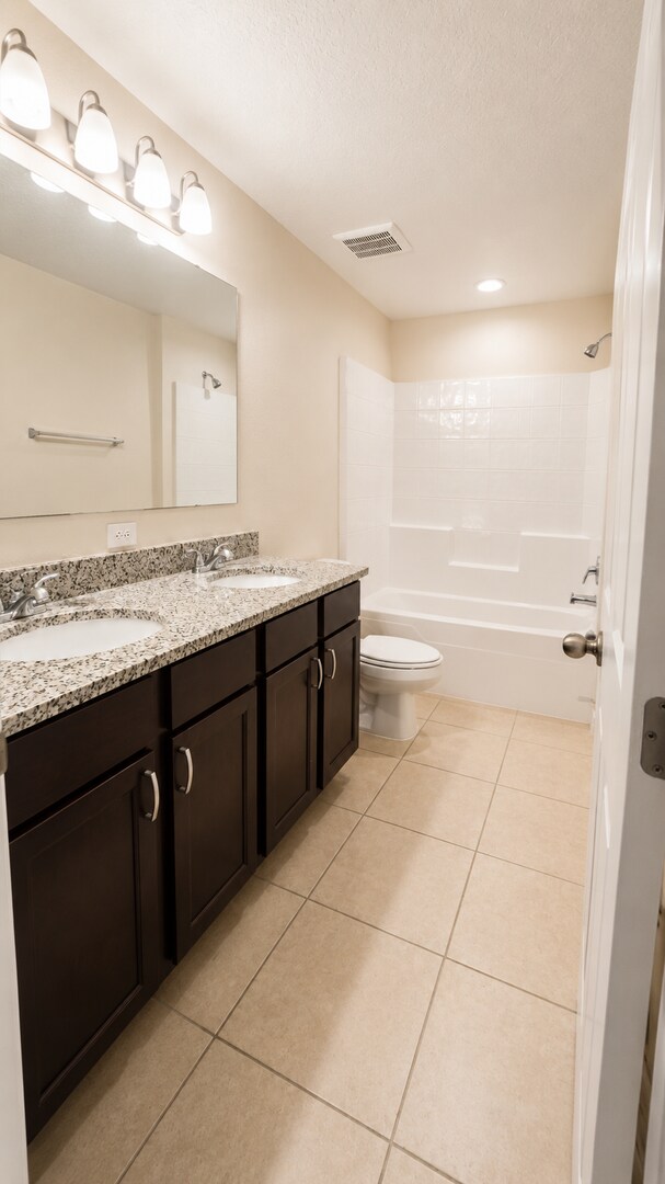 Building Photo - Beautiful Corner-Unit Townhome in a Gated Community!