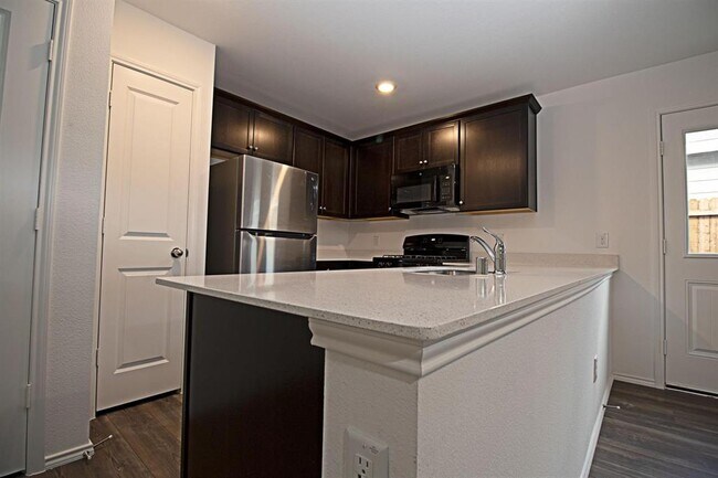 Building Photo - 5701 Manarchos Ln