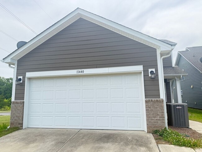 Building Photo - Beautiful Westbranch Home with 2-Car Garage, Covered Porch & Greenway Entrance Across the Street