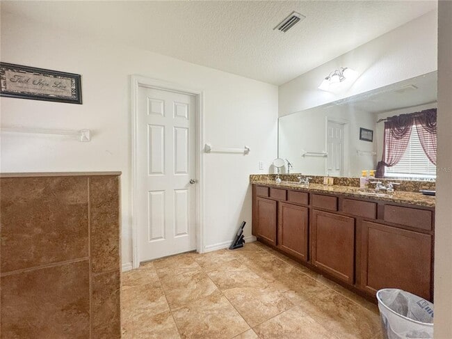 Building Photo - 5594 Angelonia Terrace