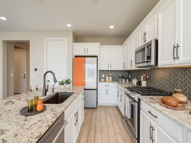 Building Photo - Amazing 4BR 2.5BA Home w/ 3-Car Tandem Garage • Pool Access • Yard w/ Fire Pit in Saguaro Trails