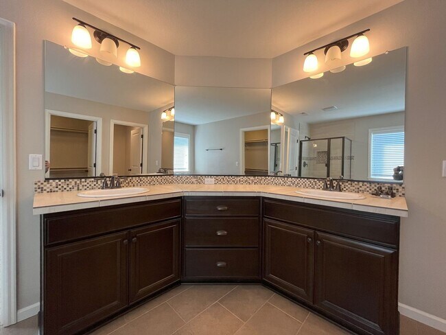 Building Photo - Spacious 4-Bedroom + Bonus Room with Modern Kitchen, Solar Panels & Private Fenced Backyard!