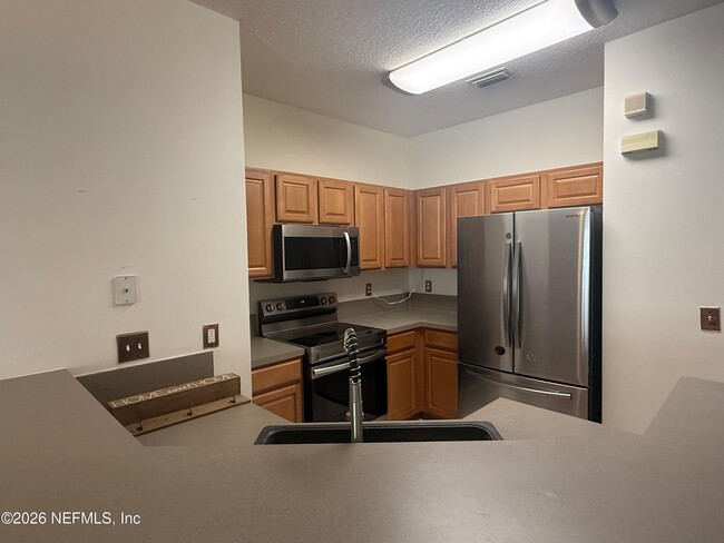 Building Photo - 9783 Summer Grove Way W