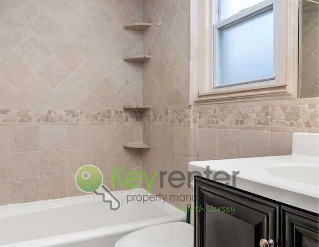 Building Photo - No Broker Fee | Spacious 3-Bed, 2-Bath Nutley Home with Bonus Office & Gourmet Kitchen