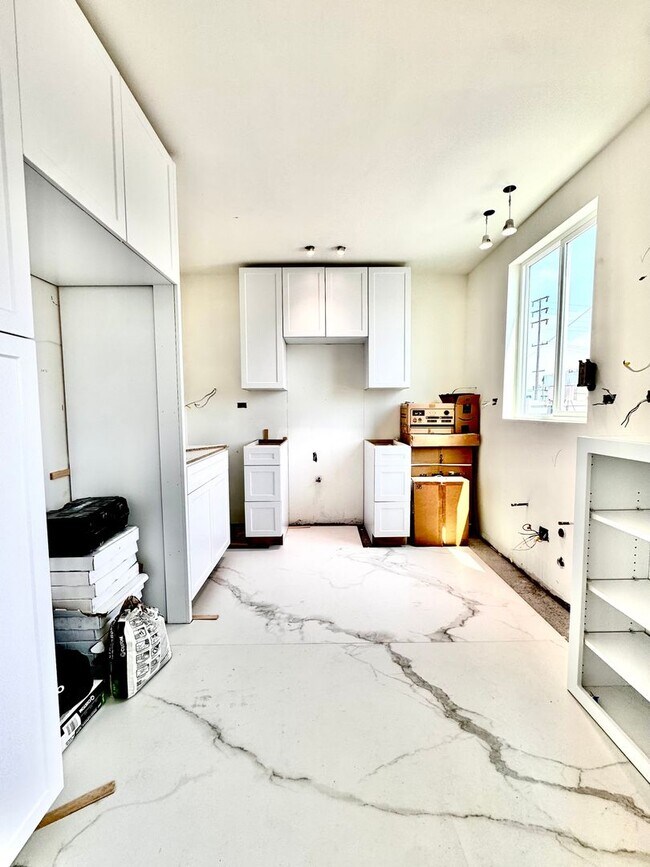 Building Photo - Limited-Time Offer for Qualified Tenants: