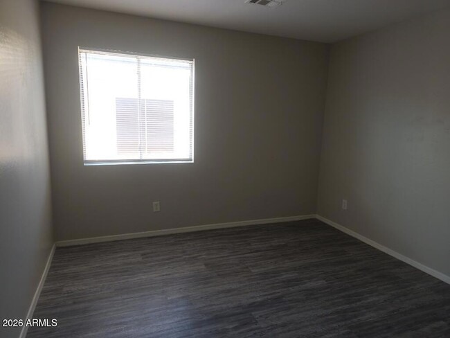 Building Photo - 23942 W Lasso Ln