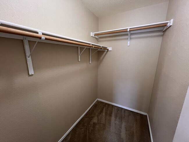 Building Photo - Generous Outdoor Space & Lawn Care Included!