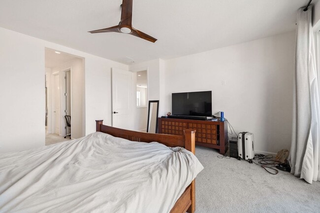 Building Photo - Beautiful 4BR/4BA home in the gated Copper View community. Features spacious living areas, mounta...