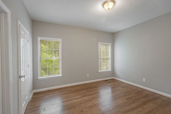 Building Photo - Like New Home off Freeman Mill. Just Painted, New Wood/Vinyl Flooring, Vaulted Ceilings, Front Po...