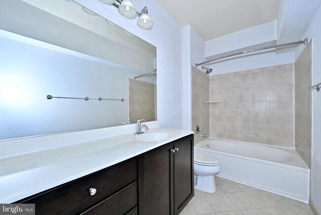 Building Photo - This impeccable 2-bedroom, 2-full bathroom condo is located in the sought-after, super-convenient...