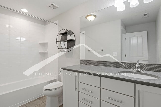 Building Photo - Elegant Ranch-Style Home with Main Floor Primary Bedroom with 3-Car Garage and Finished Basement ...