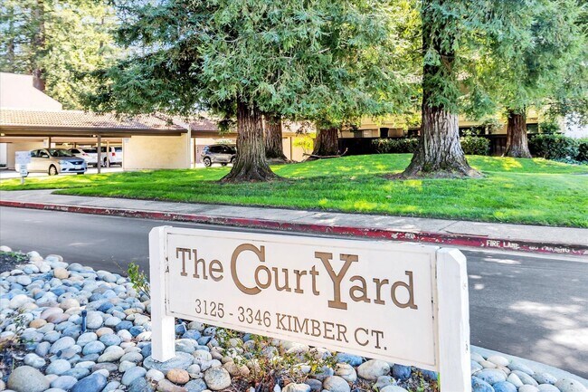 Building Photo - Stylish End-Unit Condo l Private Patio l Community Pool