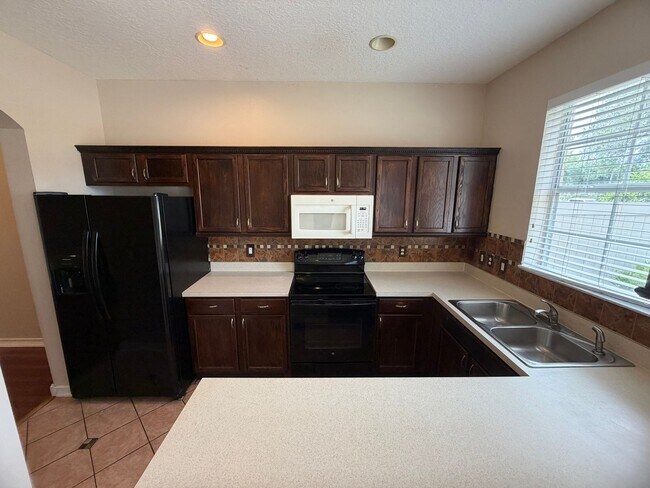 Building Photo - 9434 Silver Buttonwood St