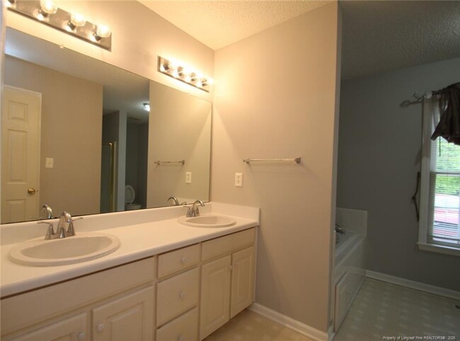 Building Photo - 8105 Tuxford Dr
