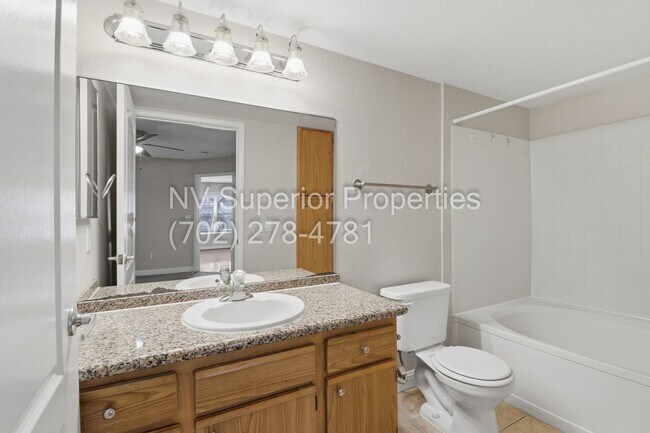 Building Photo - SW!! First floor unit with Balcony!! Gated!! Clubhouse!!  Community pool!! Spa!! Exercise Room!! ...