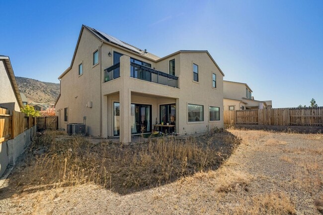 Building Photo - Beautiful 4BR/4BA home in the gated Copper View community. Features spacious living areas, mounta...