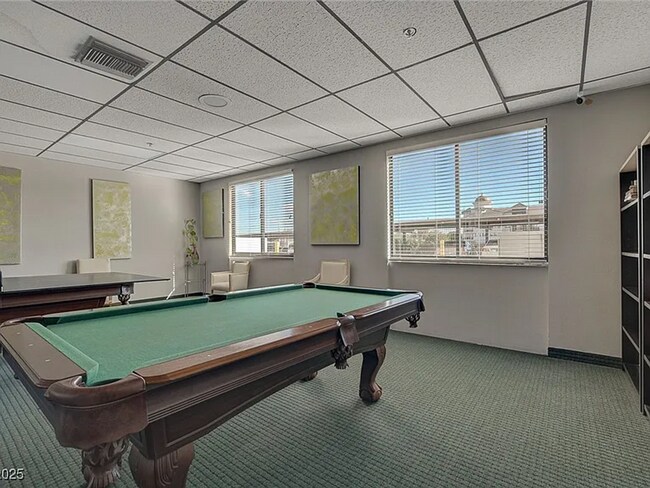 Building Photo - Enjoy resort-style living in this 2 Bed 2 Bath Condo with Stunning Strip Views in the Wimbledon C...