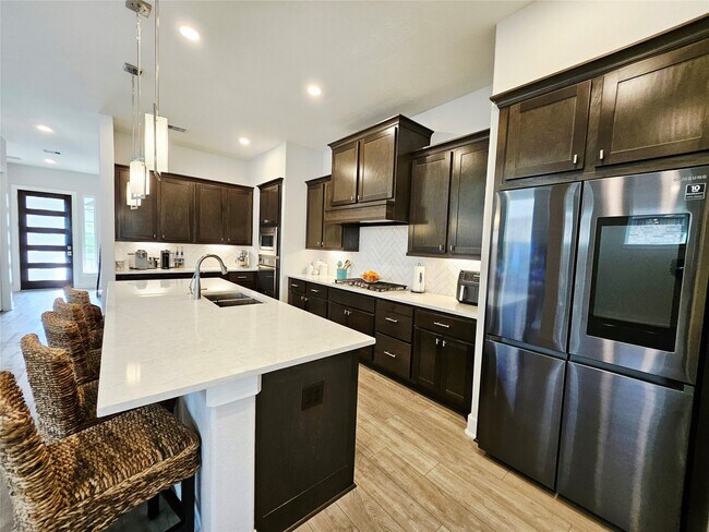 Building Photo - 15822 Pilot Knob Dr