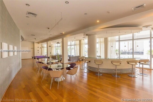Building Photo - 10275 Collins Ave