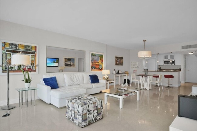 Building Photo - 10275 Collins Ave