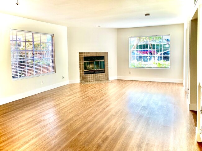 living room with fire place & wood floor through out - 2456 Arizona Ave
