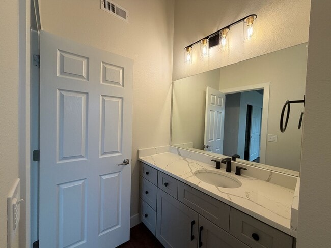 Building Photo - Remodeled Top-Level Condo in Pool Community Near Shopping & Dining