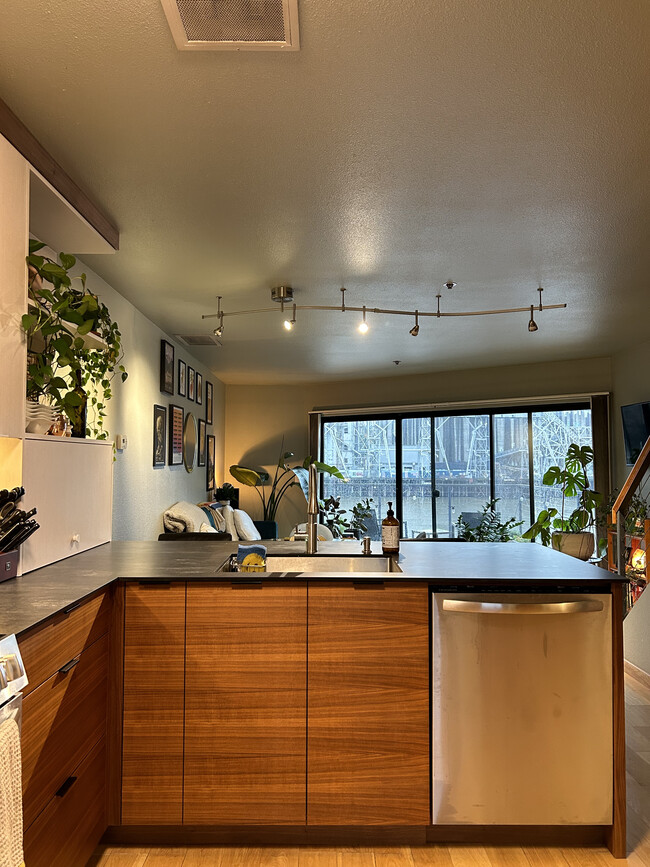 Updated Kitchen, view from far wall/fridge area - 710 NW Naito Pky