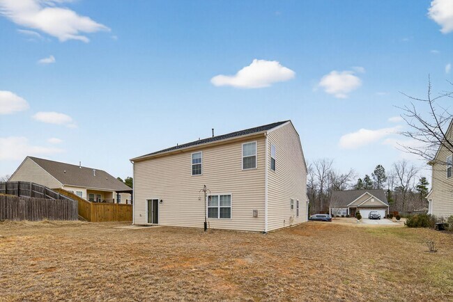 Building Photo - Spacious 4BR Energy-Efficient Home with Loft, Big Yard & Top-Rated Schools!