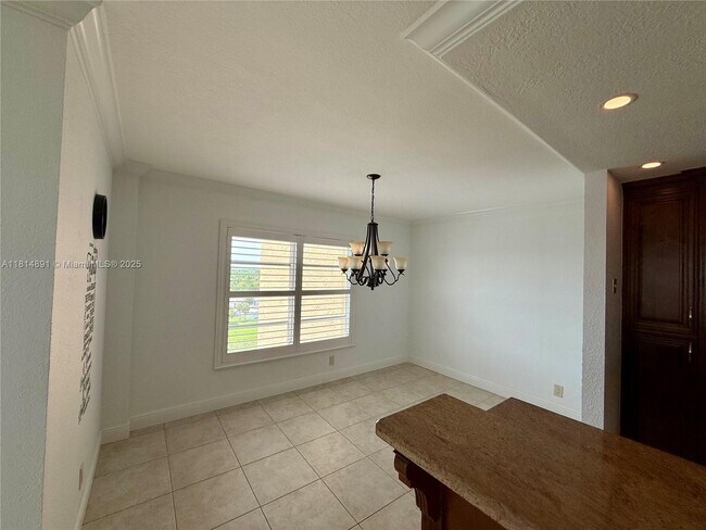 Building Photo - 10777 W Sample Rd