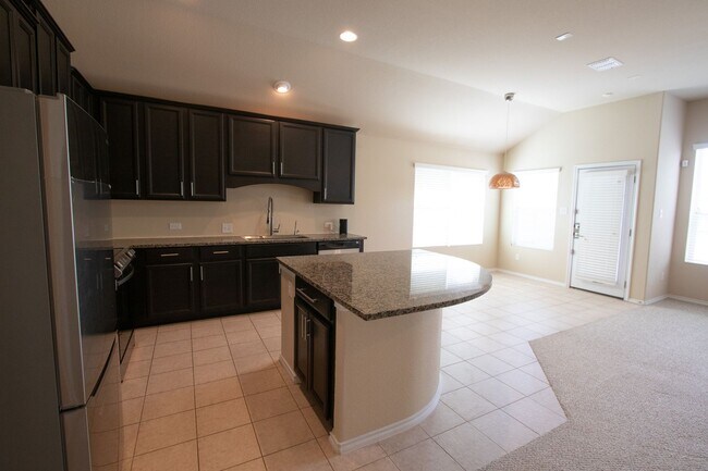 Building Photo - TWO WEEKS FREE RENT!!!  Welcome to this charming 3-bedroom, 2-bathroom home located in the vibran...