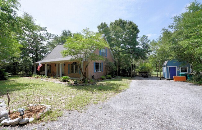 Building Photo - Charming Home in Poquito Bayou – A Nature ...