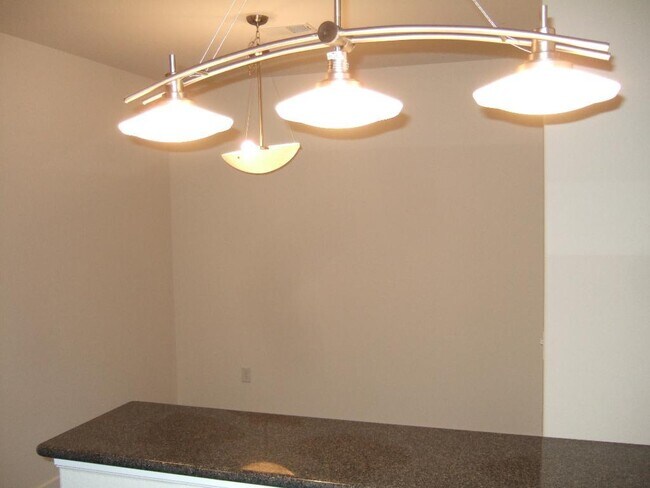 Building Photo - "Spacious 3-Bedroom Denver Condo with Cozy Fireplace & Modern Comforts!"