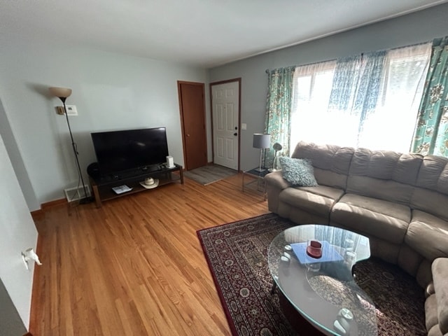 hardwood floors and entry closet - 7215 18th Ave S