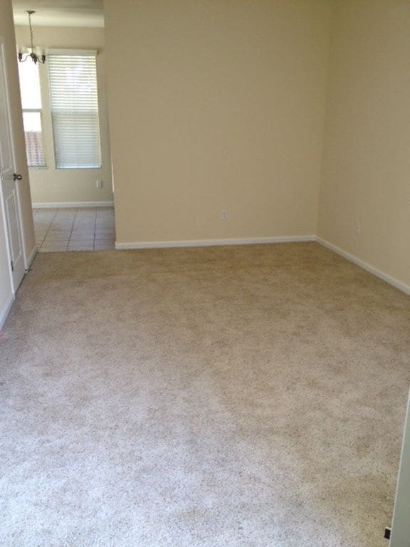 Building Photo - Great 3 bedroom/2.5 bath duplex w/2 car garage!