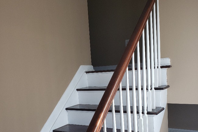 Wood stairs going to 3rd Floor - 39 Russell Ct