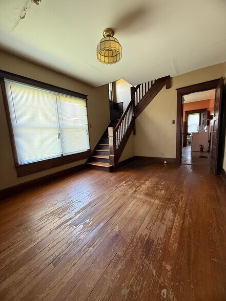 Room by kitchen/dining room - 906 E Morris St