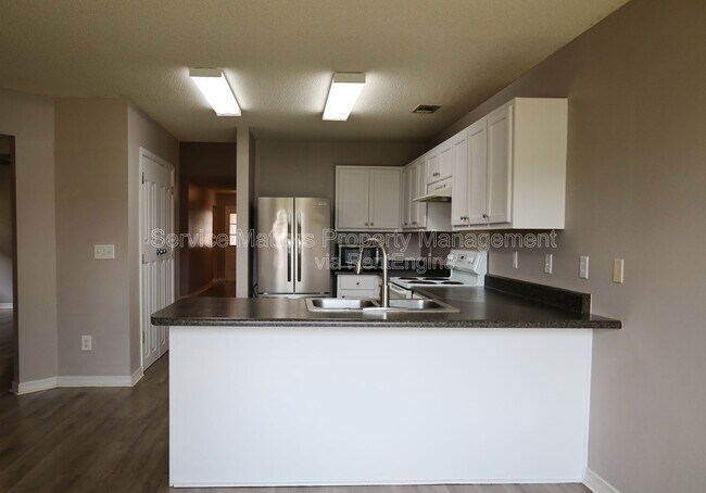 Building Photo - 5079 Cocoa Dr