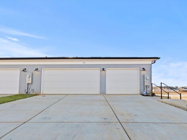 Building Photo - 3 Car Garage! Modern end-unit townhome located in the desirable Clift Farm!