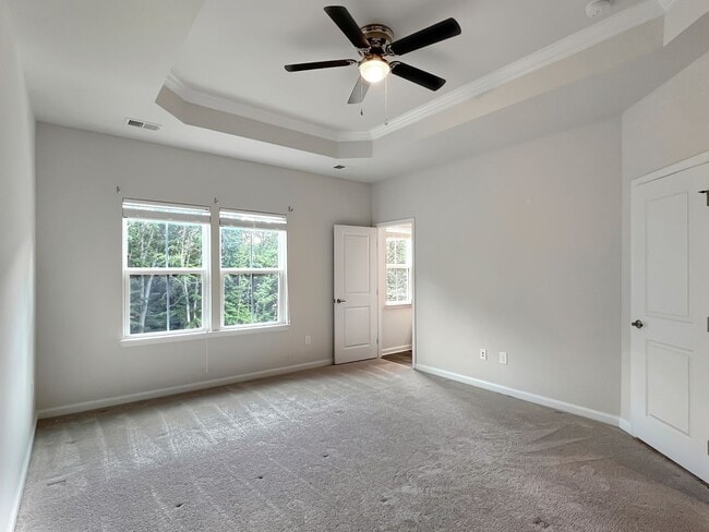 Building Photo - Move-In Ready Townhome with Finished Basem...