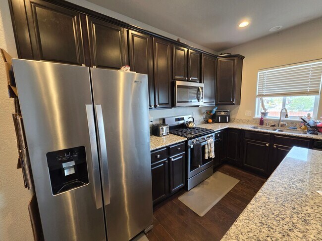 Building Photo - Fully Finished Corner-Lot Home with Mounta...