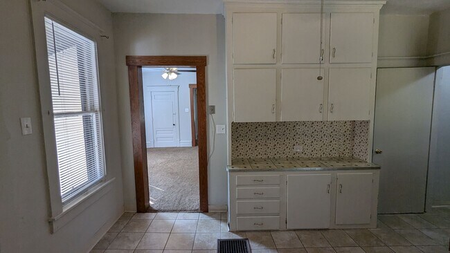 Building Photo - Come live in a charming 3-bedroom house in...