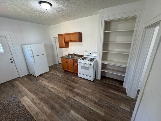 Building Photo - Enormous Completely Updated 4-Bedroom 1-Bath House w/ Flat Yard!!!