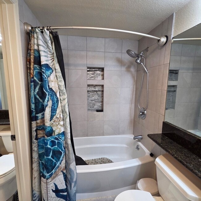 Building Photo - Pet Friendly downstairs 2/1.5-bedroom North Kihei Condo