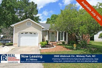 Building Photo - Charming home with open floor plan, vaulted ceilings and spacious backyard